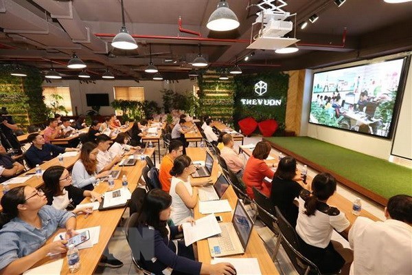 Hội thảo Bàn giải pháp thu hút nguồn lực trong nước và quốc tế cho khởi nghiệp sáng tạo Việt Nam. (Ảnh: Anh Tuấn/TTXVN)